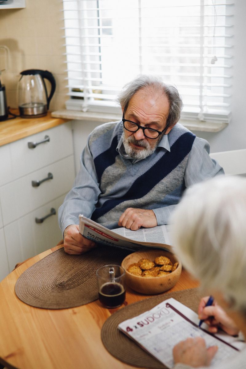 Elderly couple enjoying a peaceful morning with coffee at home